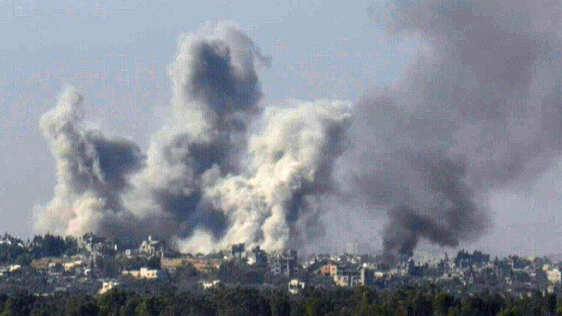 Heavy shelling on the Gaza Strip seen from Israel