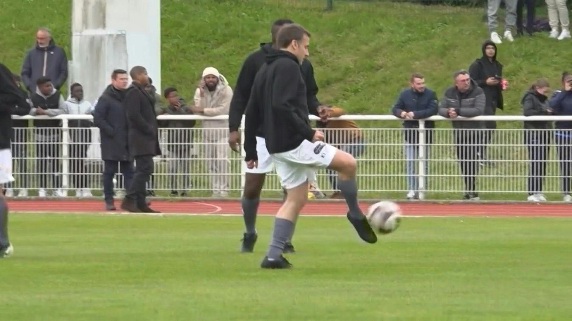 France's Macron takes part in charity football match