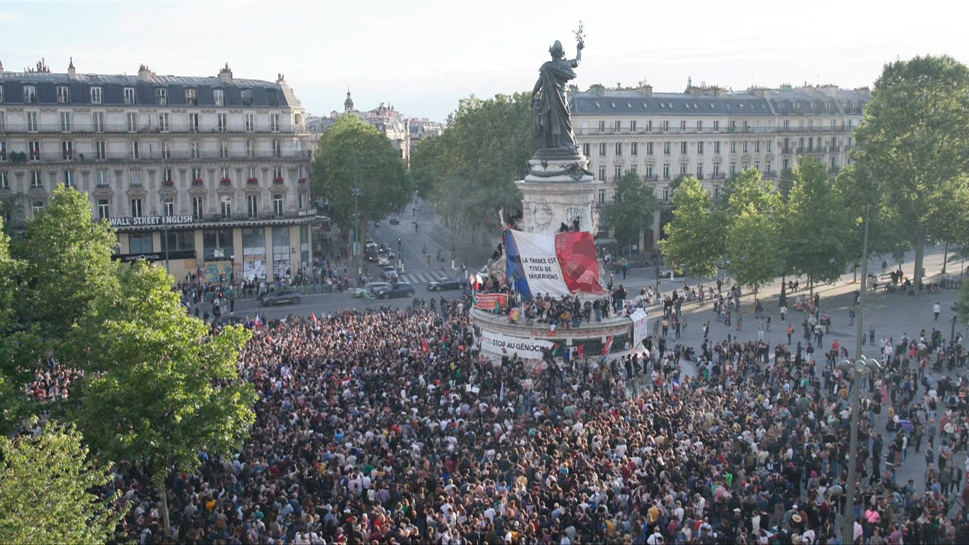 Left-wing sympathisers gather at Place de la Republique in Paris