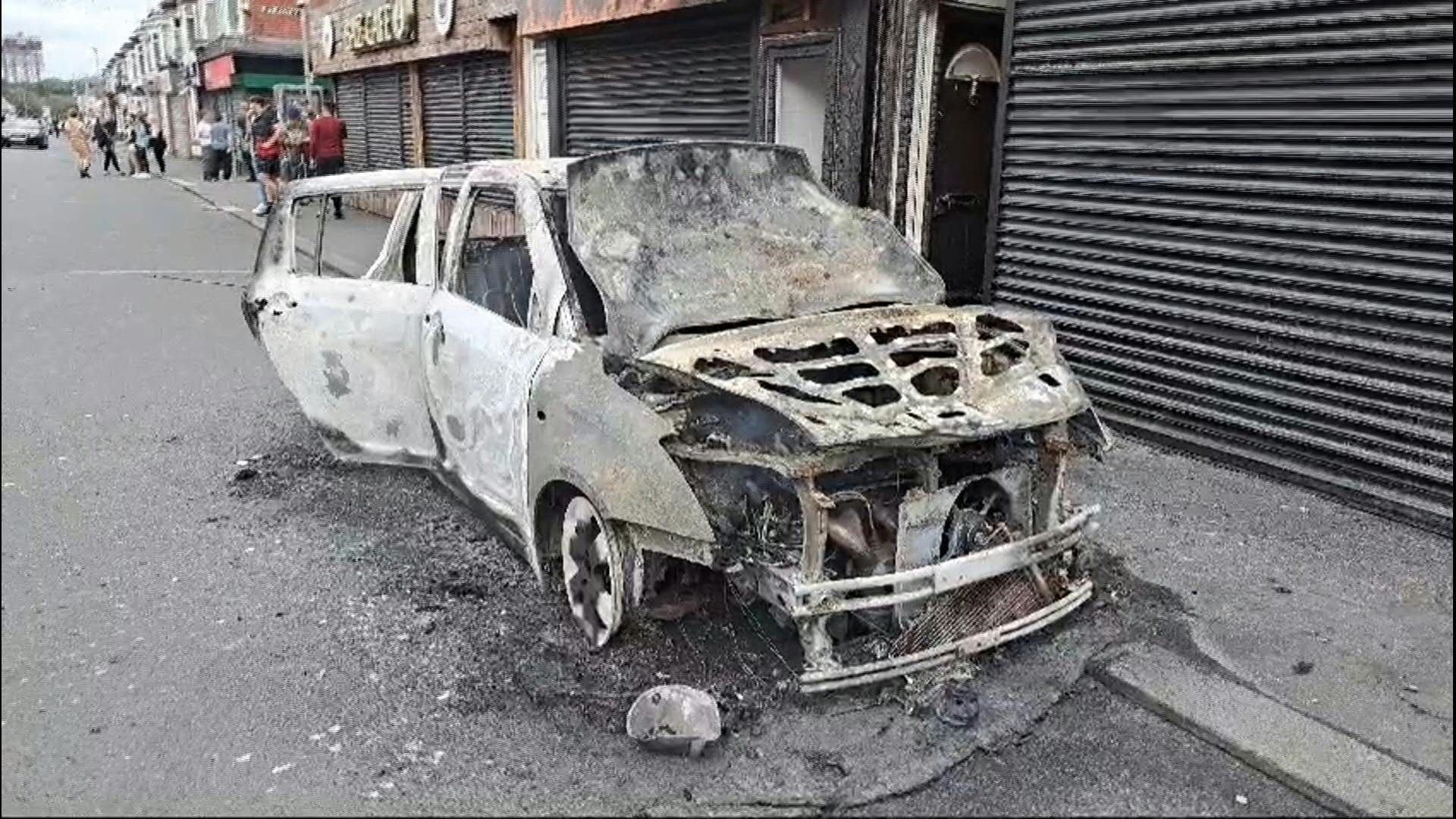 Burnt-out cars and smashed shops as violence flares during Middlesbrough riot