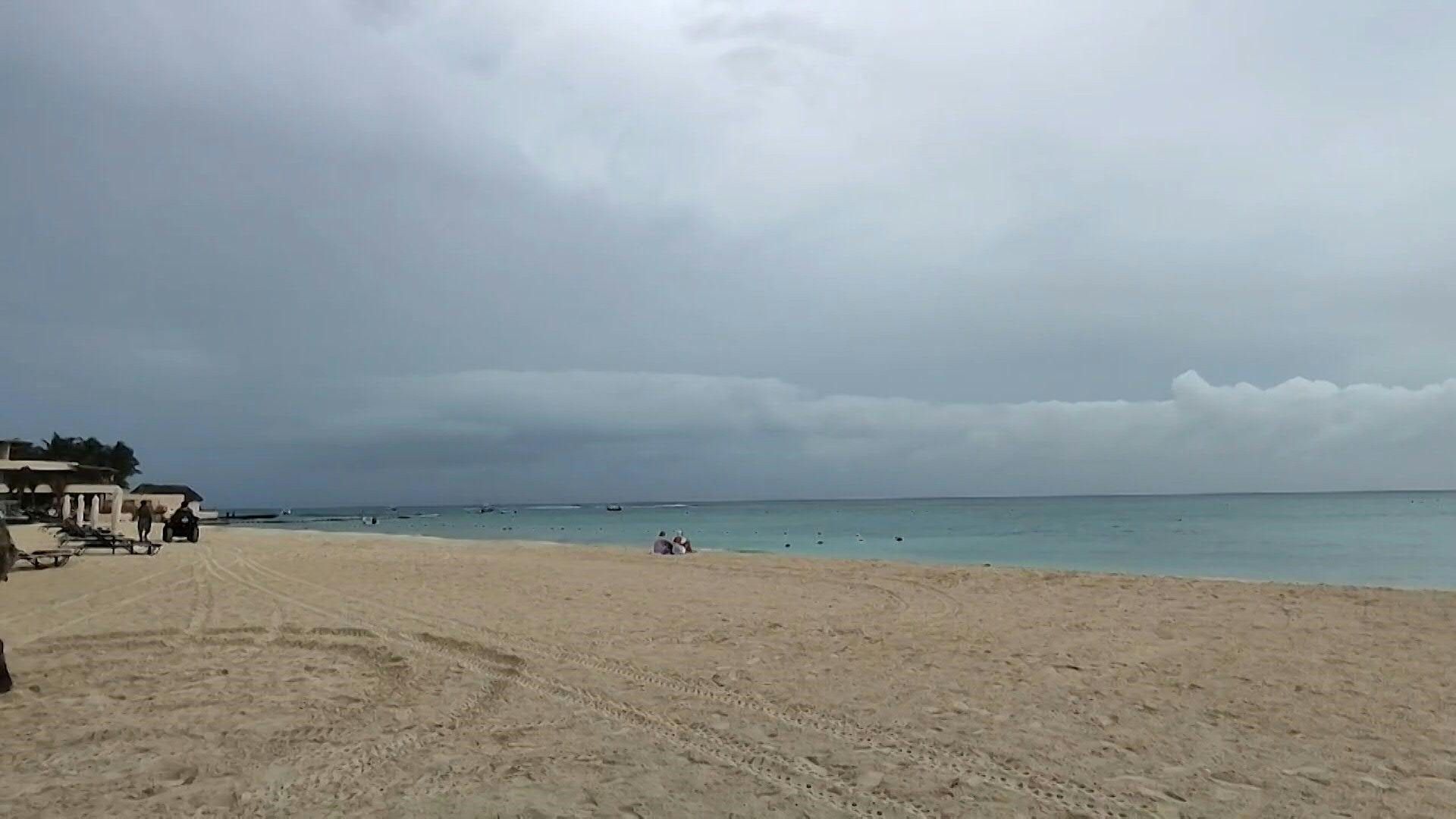 Gray skies loom over Mexico's Caribbean coast as Tropical Storm Helene forms