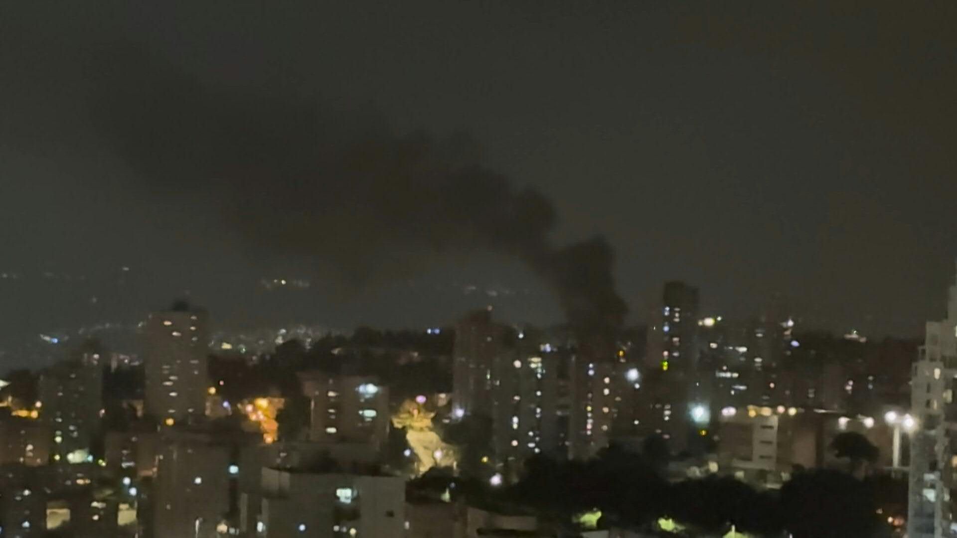 Video: Smoke rises from the northern Israeli city of Haifa after Iran missile barrage