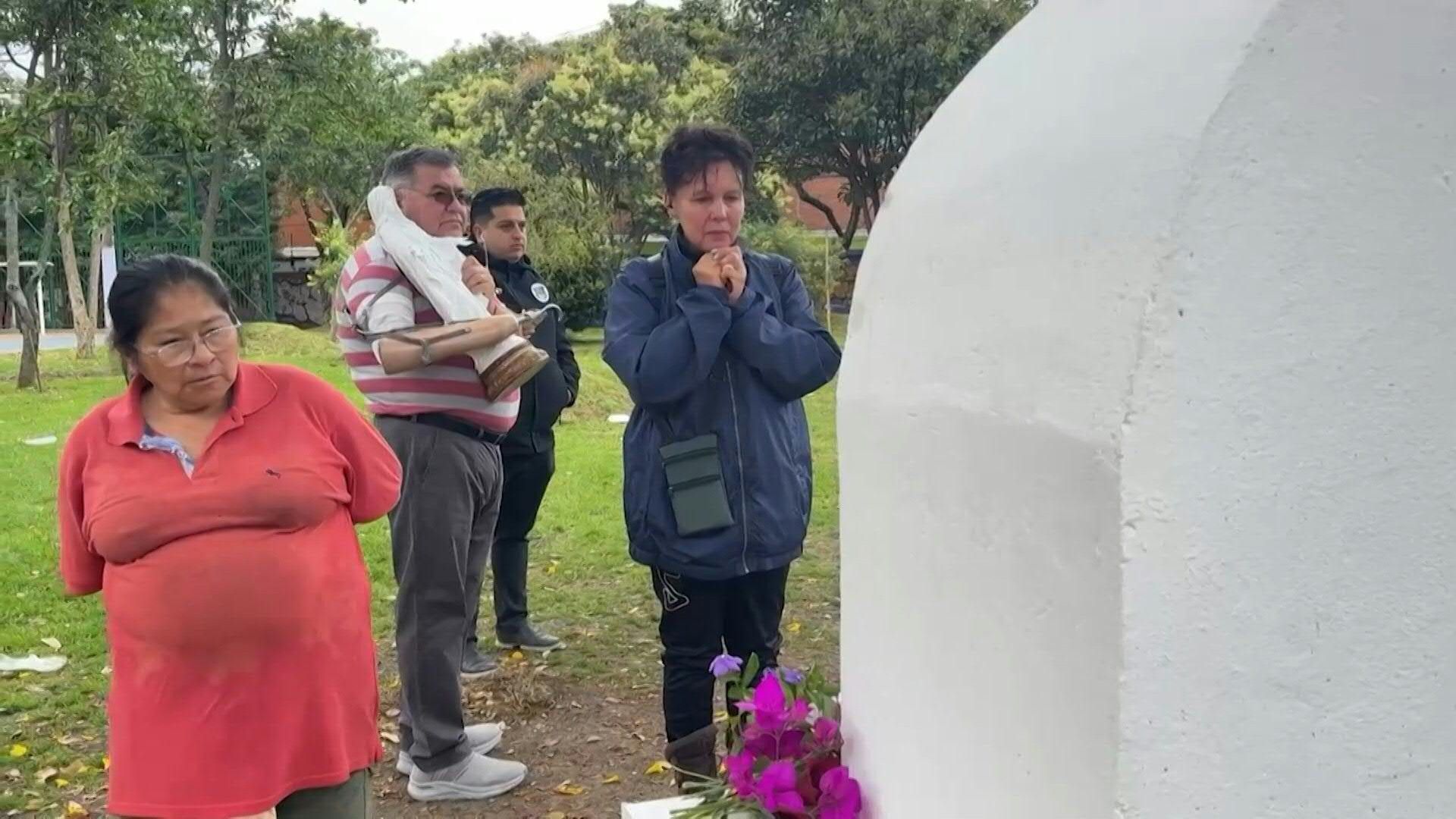Colombians mourn at the site where presidential candidate Miguel Uribe was shot