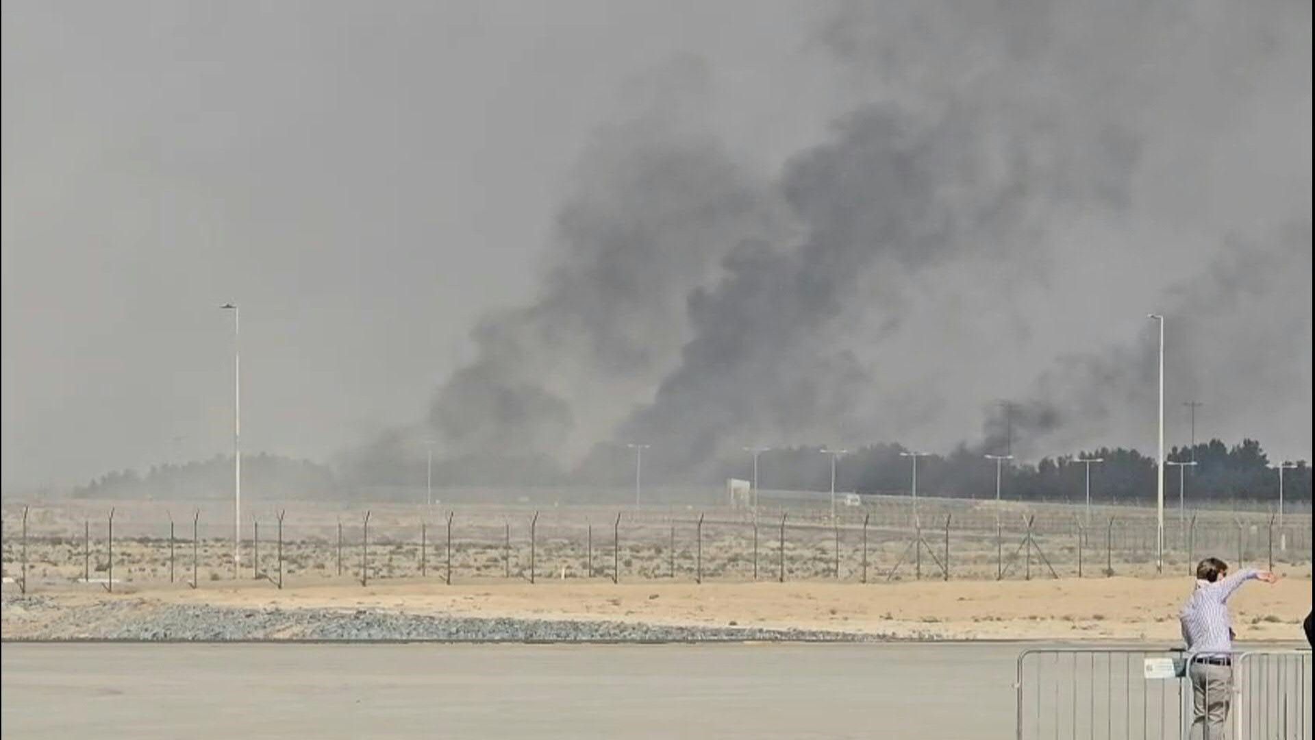 Smoke billows from the crash site at Dubai Airshow