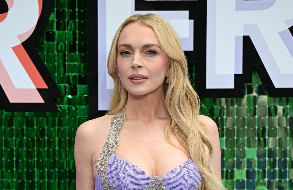 Lindsay Lohan hopes Freakier Friday helps cinemagoers to forget about what's going on in the world