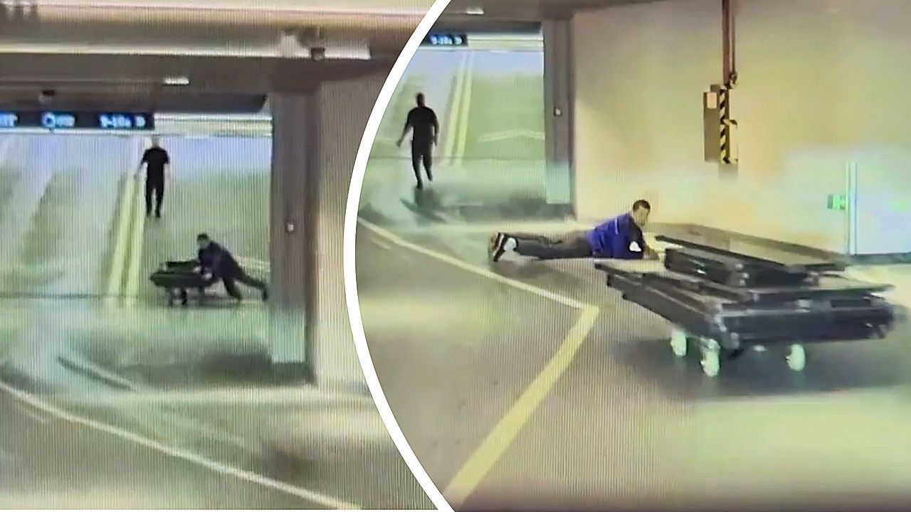 Bungling worker comically loses control of shopping cart – loaded with glass