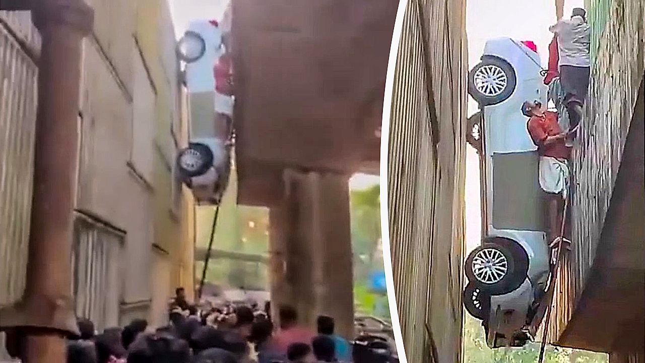 Driver gets car stuck vertically after drunken crash at construction site