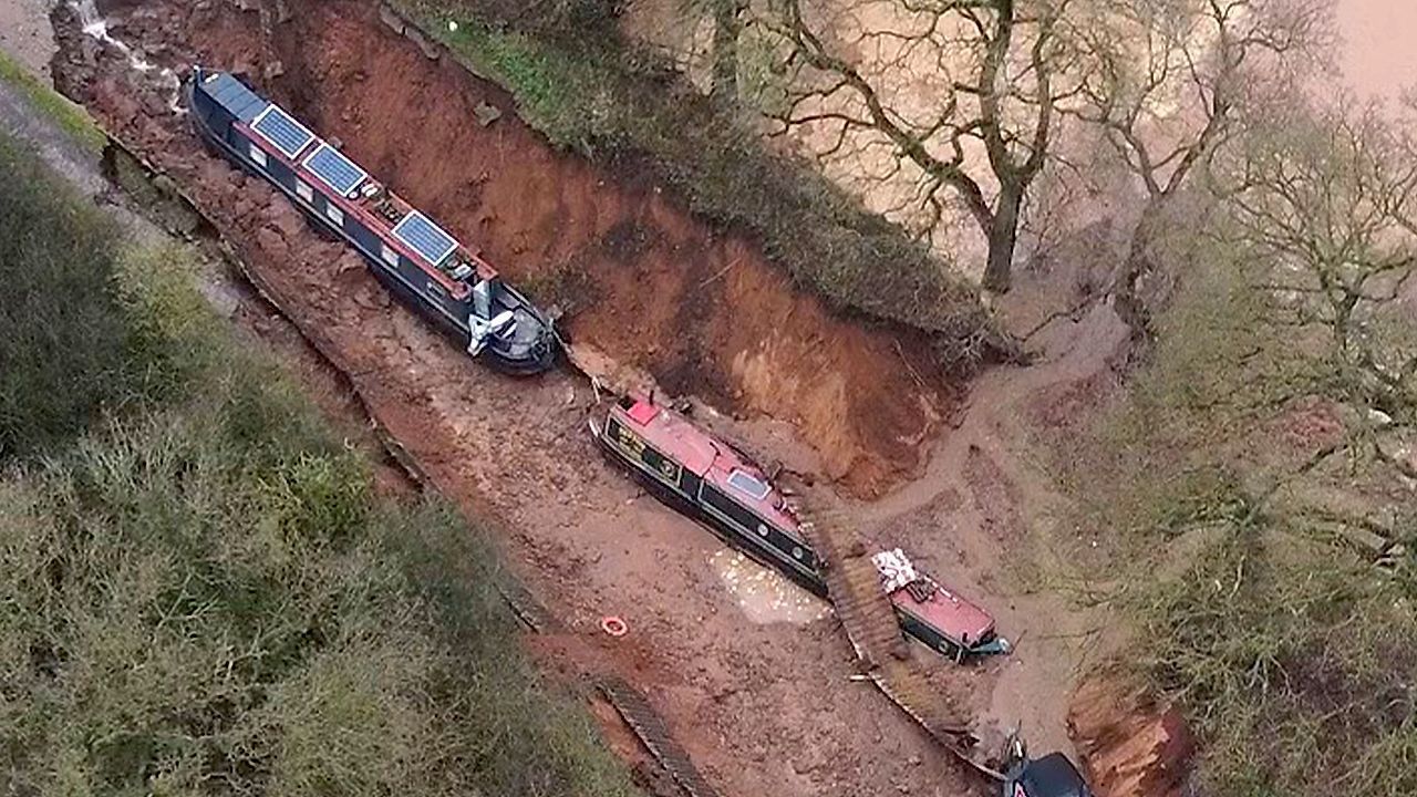 Video: Massive sinkhole swallows canal boats in England
