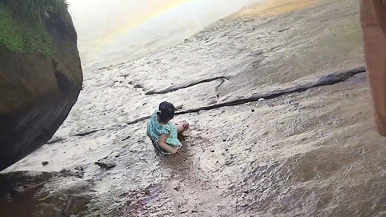 Video: Toddler slips toward waterfall before last-second rescue