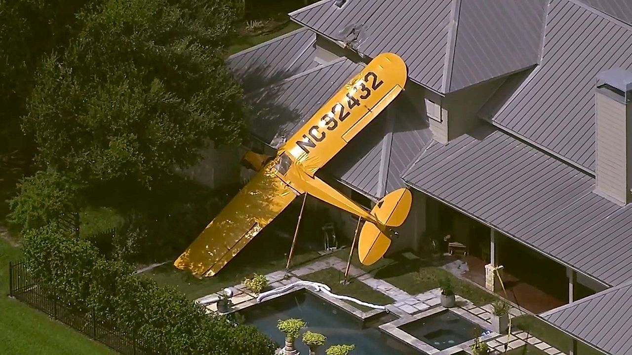 Video: Small plane crash-lands on top of Texas home