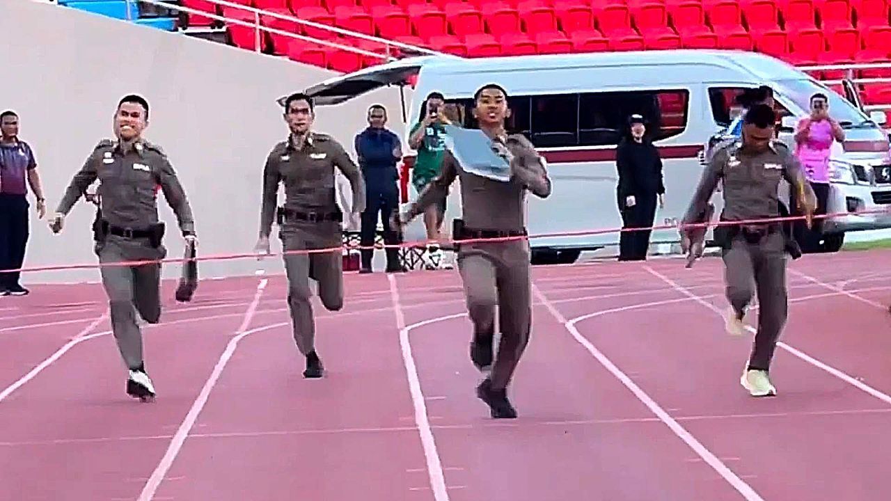 Video: Police officers race in riot gear and bulletproof vests at annual sports day in Thailand