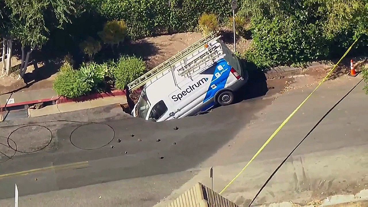 Video: Sinkhole swallows work van in Hollywood