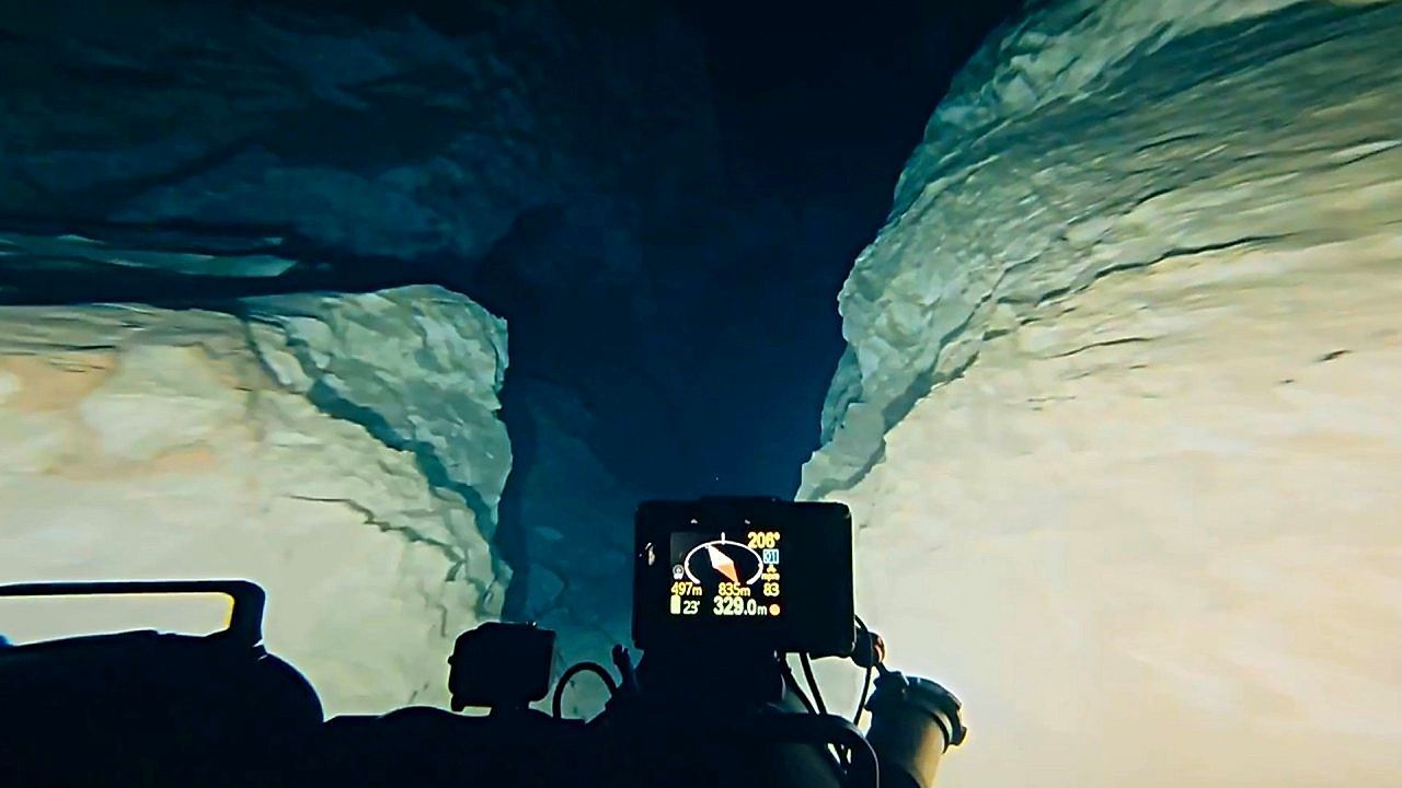 Polish diver breaks world record with 1,100-foot dive into flooded cave